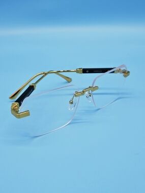 Rimless Gold-Accented Glasses with Clear Lenses